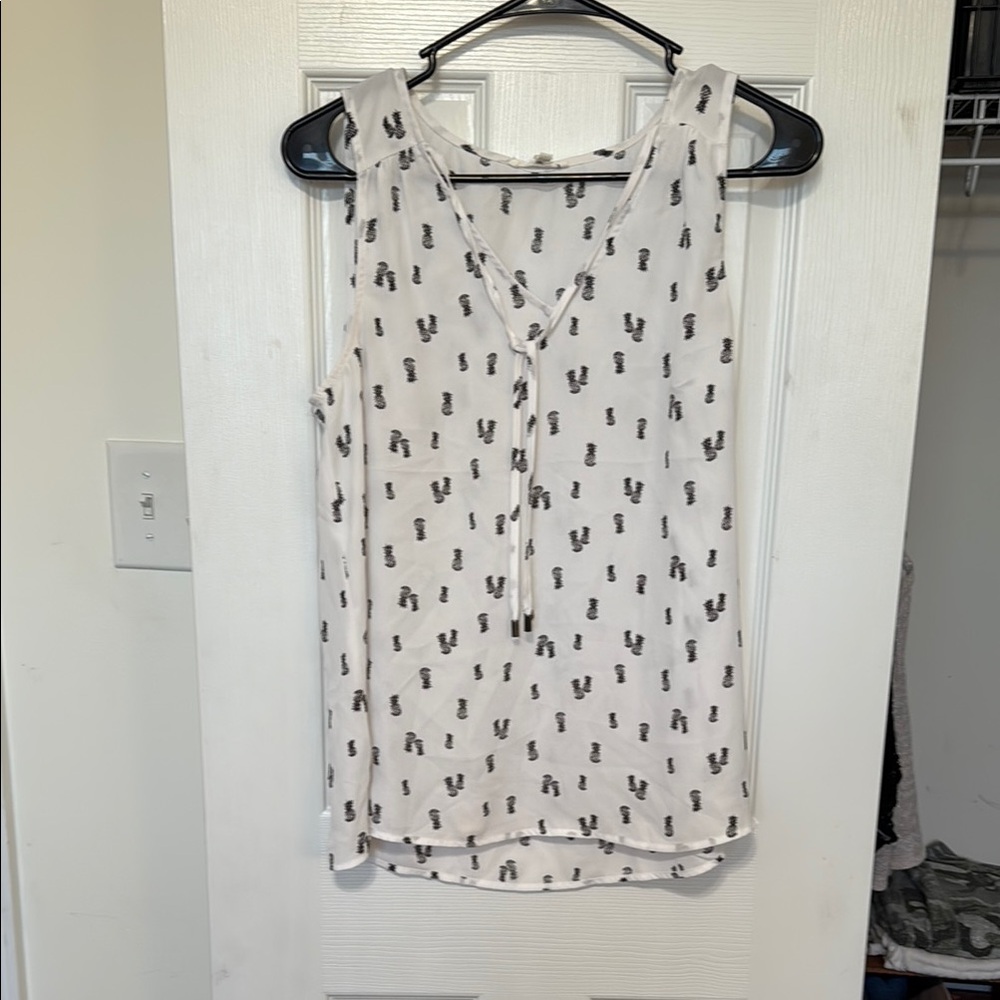 White Sleeveless Top with Black Pattern
